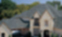 Image of roof on large house with many gables.