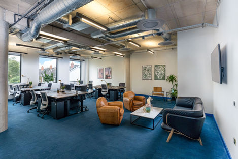 Breakout lounge and collaborative workspace in premium office building