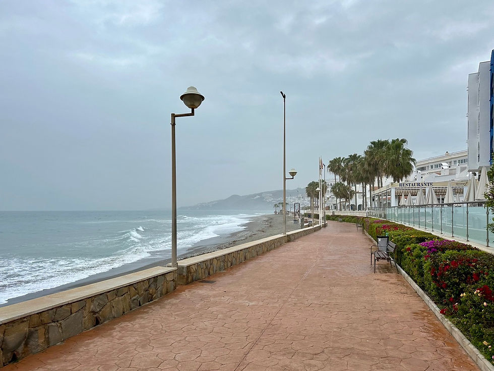 Rainy day on Playa el Chucho highlighting Costa del Sol’s much-needed rain and water crisis recovery.