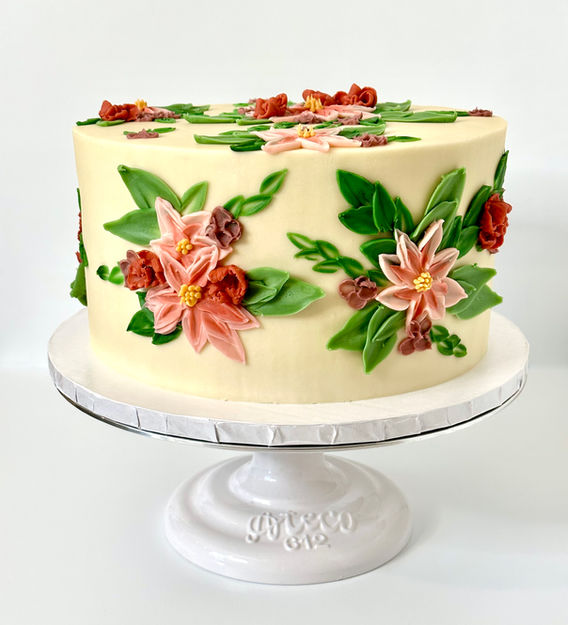 Palette knife flower cake.  White cake, single tier with pink, purple, and green.