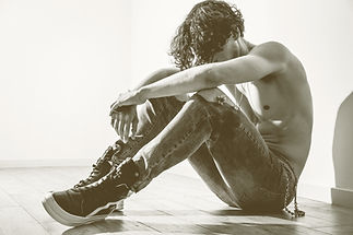 Shirtless Man Sitting Black and White