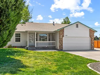 Charming 3-bedroom, 2-bath home with landscaped yard, covered patio, fenced backyard, and paved RV parking in a quiet cul-de-sac.
