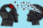paper cutouts of two head silhouettes with hearts moving out of one and into the other