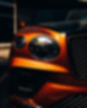 Orange and black luxury vehicle