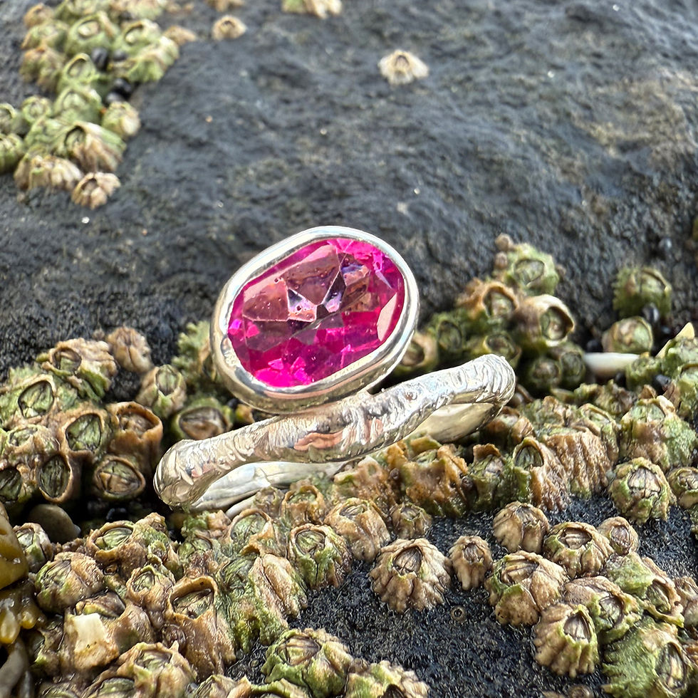 Handcrafted sterling silver ring with green gemstone cluster and organic texture