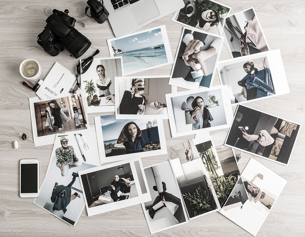 Firefly_magazine quality photos thrown across the desk scattered facing up with beauty sho