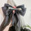 Thumbnail: The Raven Black Ruffle Wedding Veil with Detachable Bow