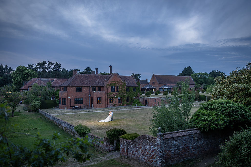 spotlight portrait at seckford hall at dusk
