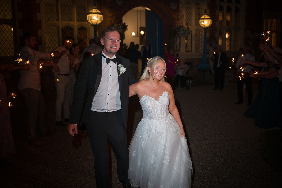 bride and groom during sparkler exit at gosfield hall