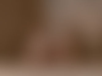 Handmade Tunisian clay vessels on a textured earthen surface, showing natural material tones and traditional ceramic forms