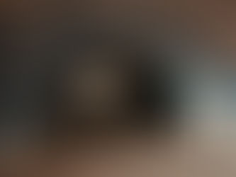 Arched corridor with aligned openings and shaded passage, illustrating longitudinal airflow geometry in Mediterranean architecture.