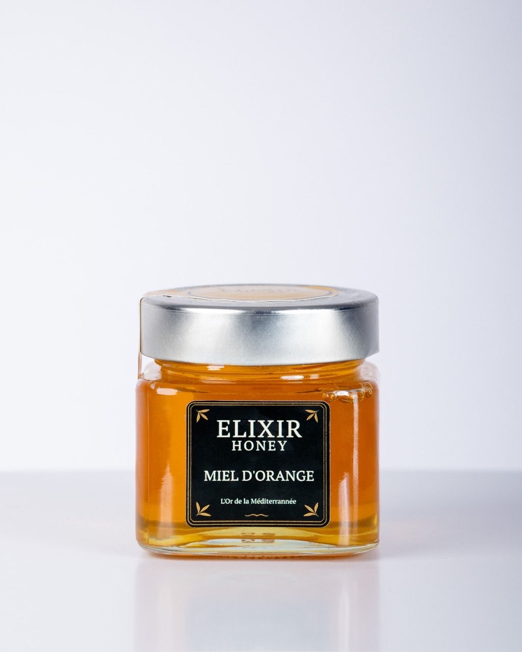 Jar of Orange Blossom Honey produced by Elixir Honey in Tunisia