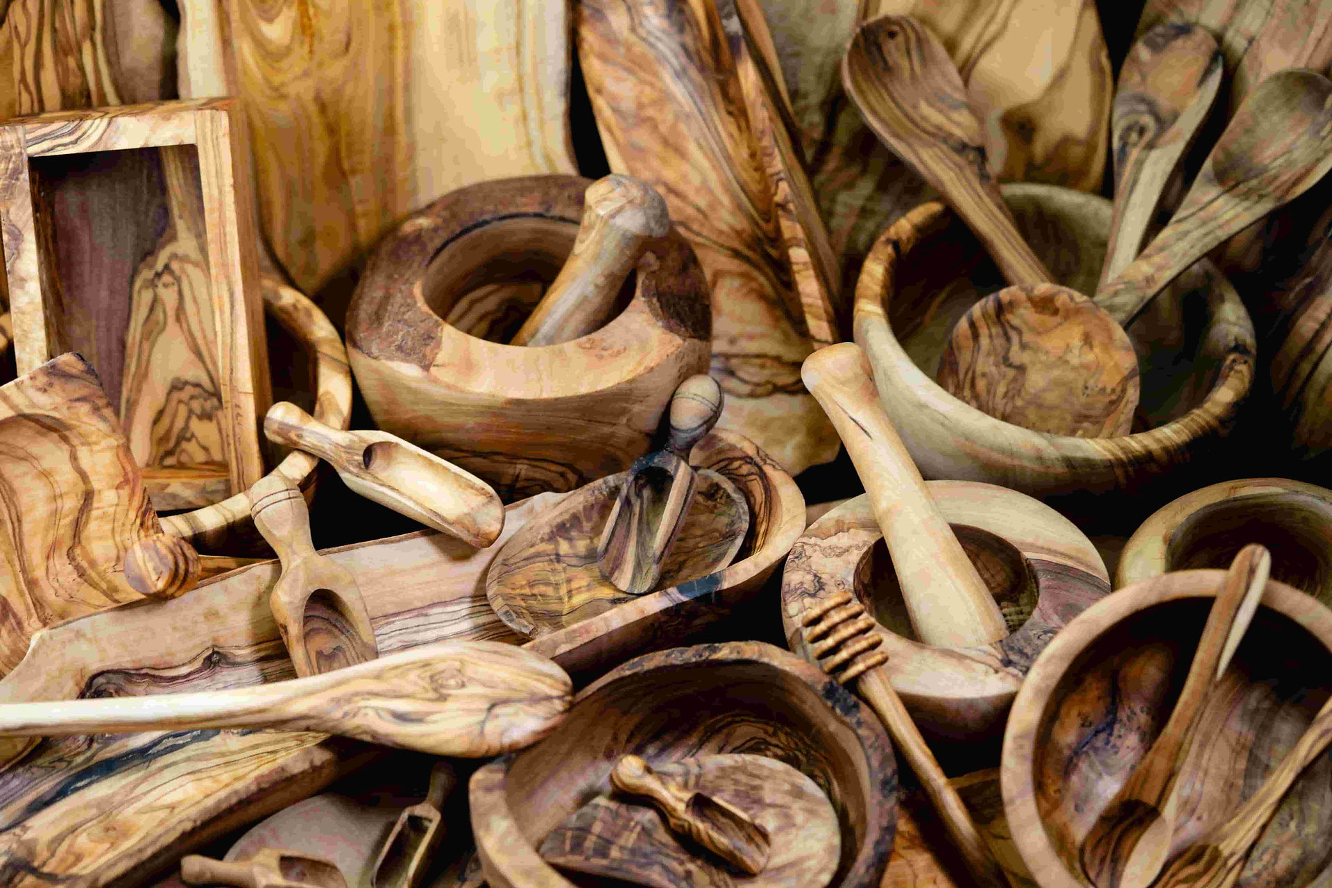 Traditional Tunisian olive wood utensils and kitchen tools carved from dense olive hardwood