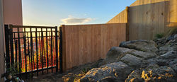 Rock + fence