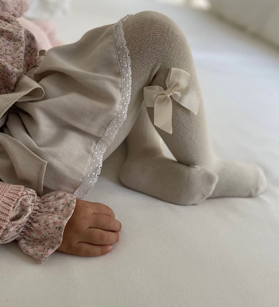 Miniaturbild: Gładkie rajstopy dziecięce z kokardą Condor