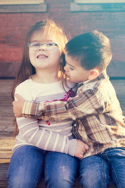 Hugging Kids in blue