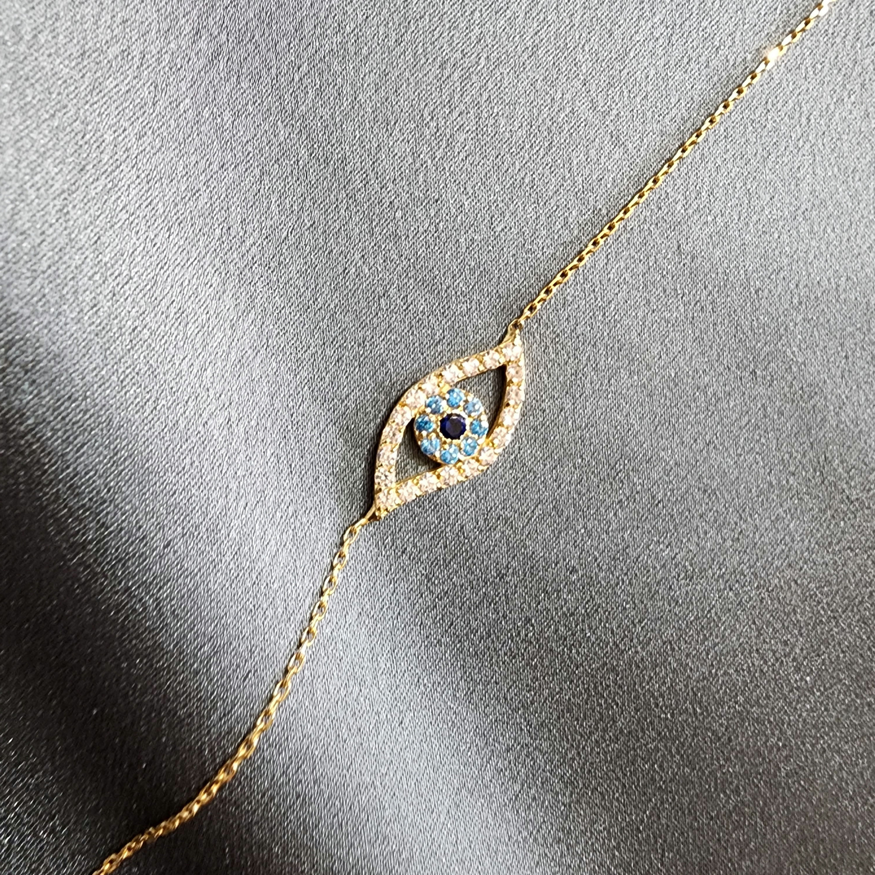 18 Karat Gold Evil Eye Bracelet with Cubic Zirconia