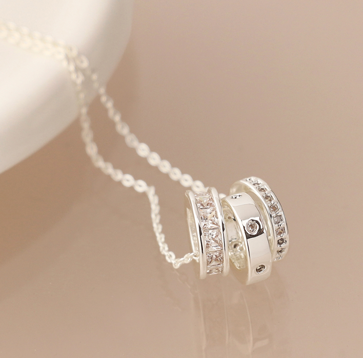 Silver plated triple mini crystal rings necklace