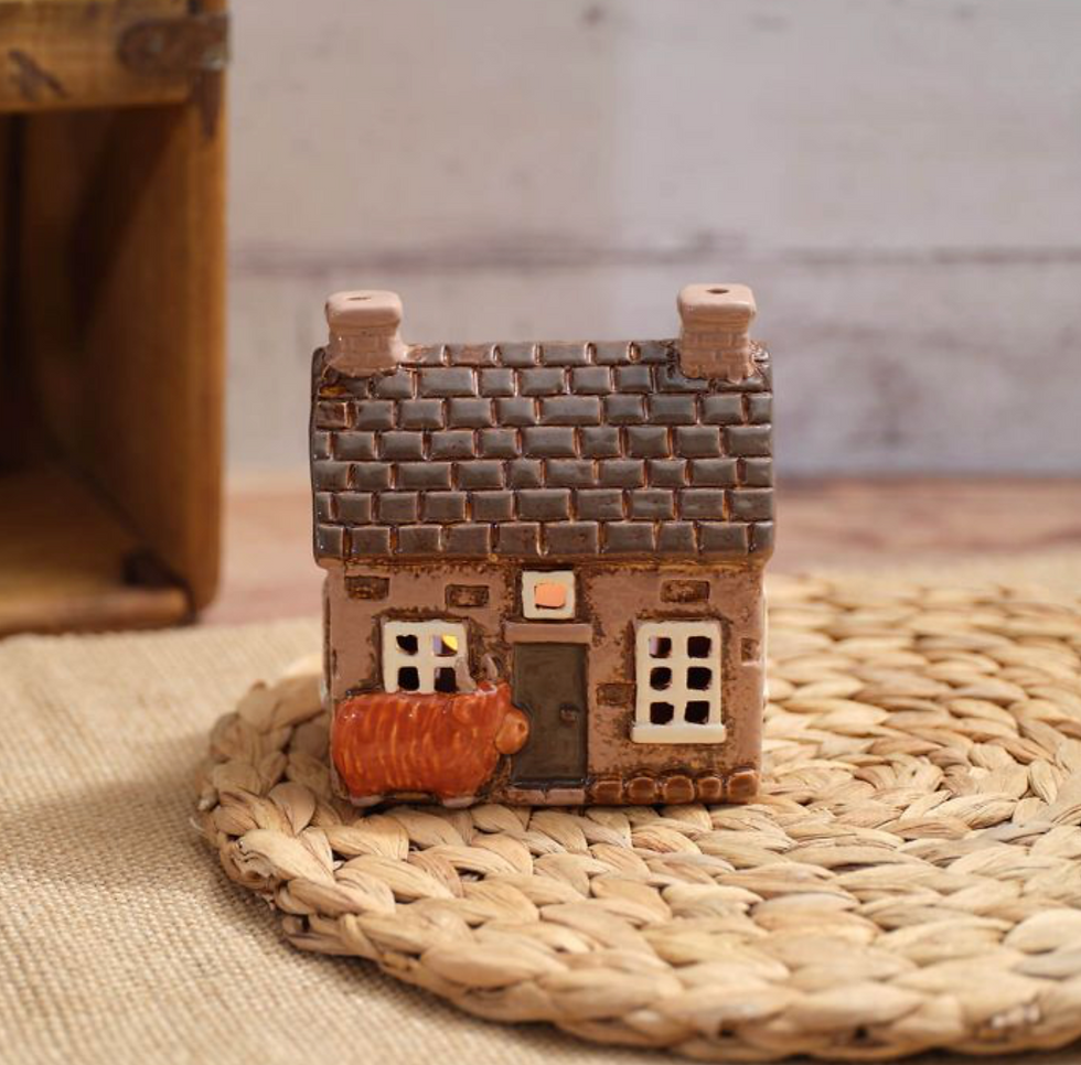 HIGHLAND COW STONEWARE BOTHY WITH EMBOSSED DETAIL CANDLE HOLDER