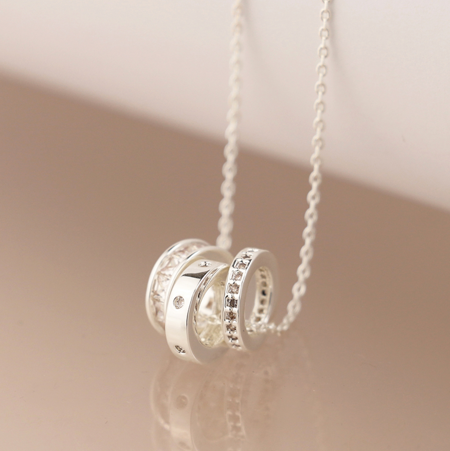 Silver plated triple mini crystal rings necklace