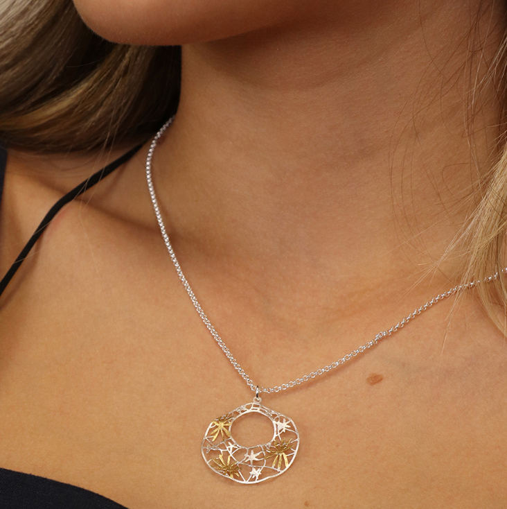 Lady wearing Silver plated and golden irregular jali floral necklace