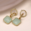 Thumbnail: Golden textured hoops and aqua stone earrings