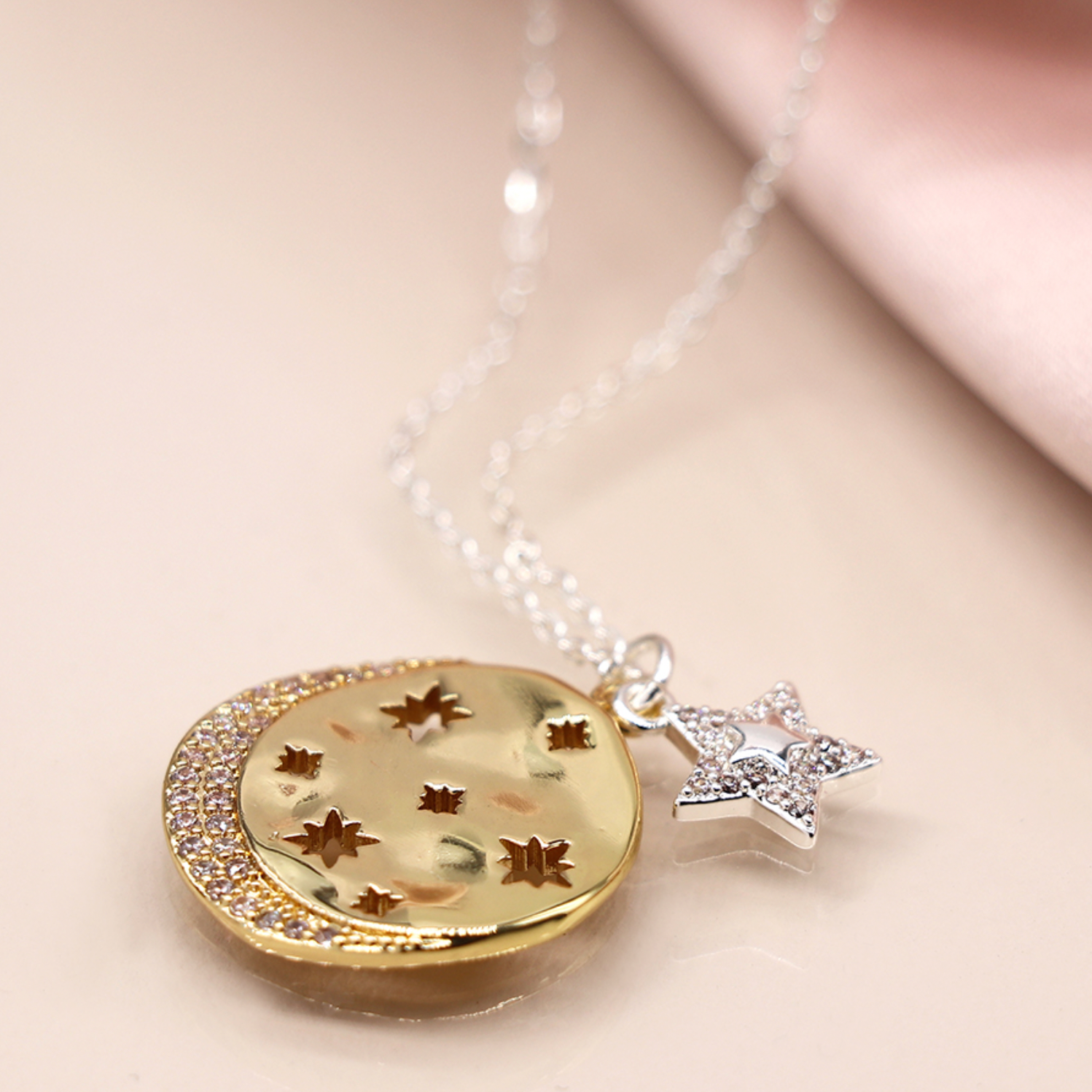 Faux gold cut-out stars crystal disc and silver plated star necklace