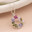 Thumbnail: Silver plated floral crystal circle necklace