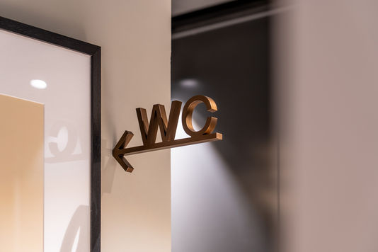 WC signage for Tura, Leeds