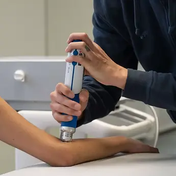 Elbow pain treatment North Shore shockwave therapy