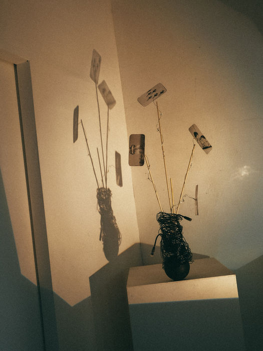 Alex Libotte working in his Berlin studio on Things We Held in Silence, surrounded by materials and sketches for the sculptural vessel series exploring collapse and renewal.