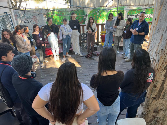 Ma'alot trainees standing in a circle