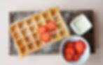 with coconut sauce and strawberries