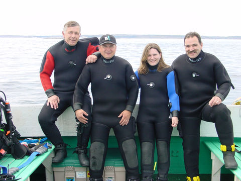 Doug Carmichael, Terry Dwyer, Suzie Dwyer and Gabe Carrier after a dive on the PORTIA in Sambro, Nova Scotia.