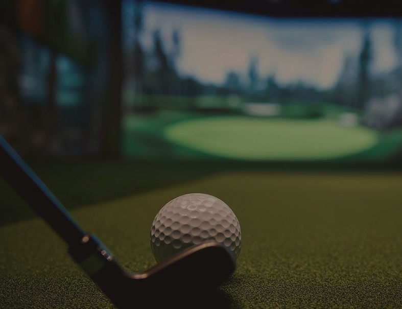 Indoor golf simulator bays at Infinity Golf Lab in Penetanguishene, Ontario.