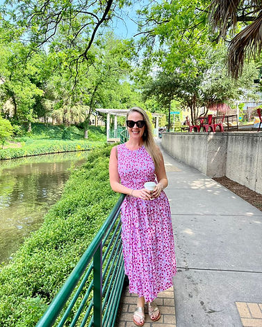 Shay Tippie, embodied sales coach for women in sales, photographed in nature.