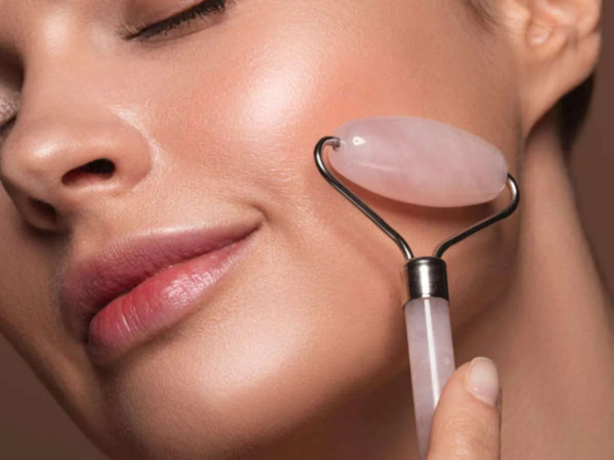glowing skin using face massager