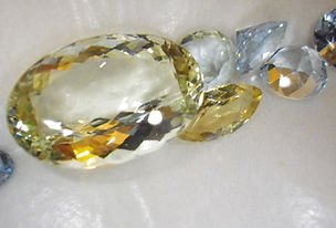 faceted beryl crystals - helidore and aquamarine