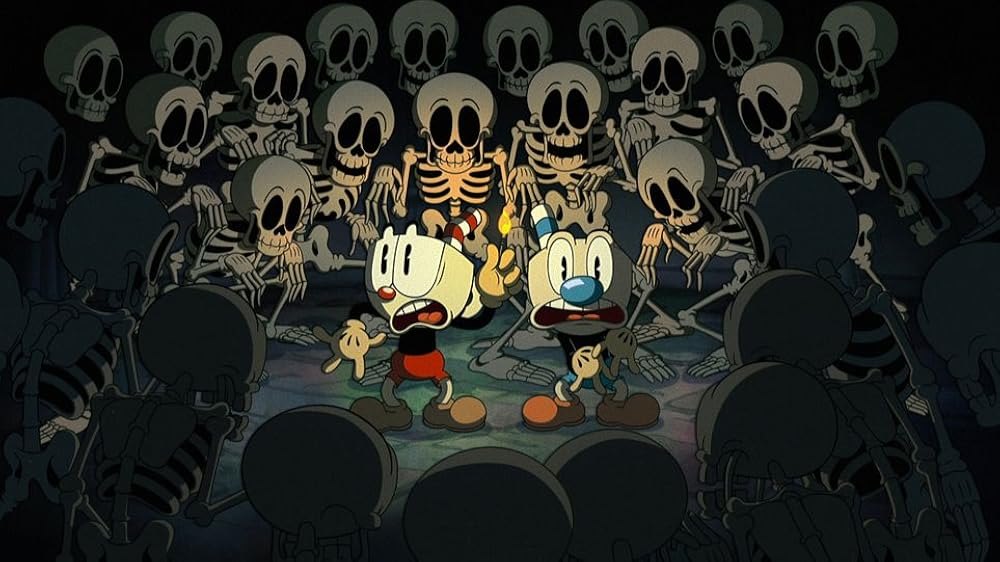 Cuphead and Mugman hold a match in a ring of grinning skeletons