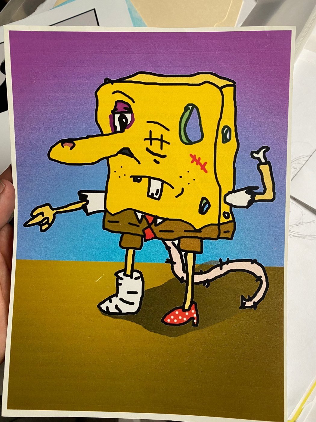 Marker drawing of Snakeclops, a brown one-eyed beast with a green snake mouth