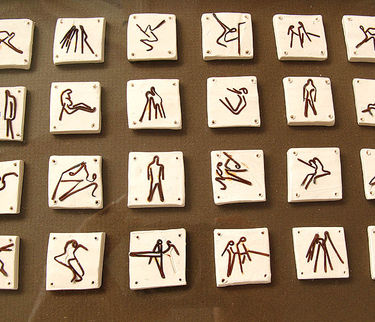 small wire figures set into porcelain by Helen Edwards