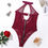 Thumbnail: Sultry Zip-Up Bodysuit – Show off your bold side with this chic, form-fitting bodysuit featuring a daring zip-up design.