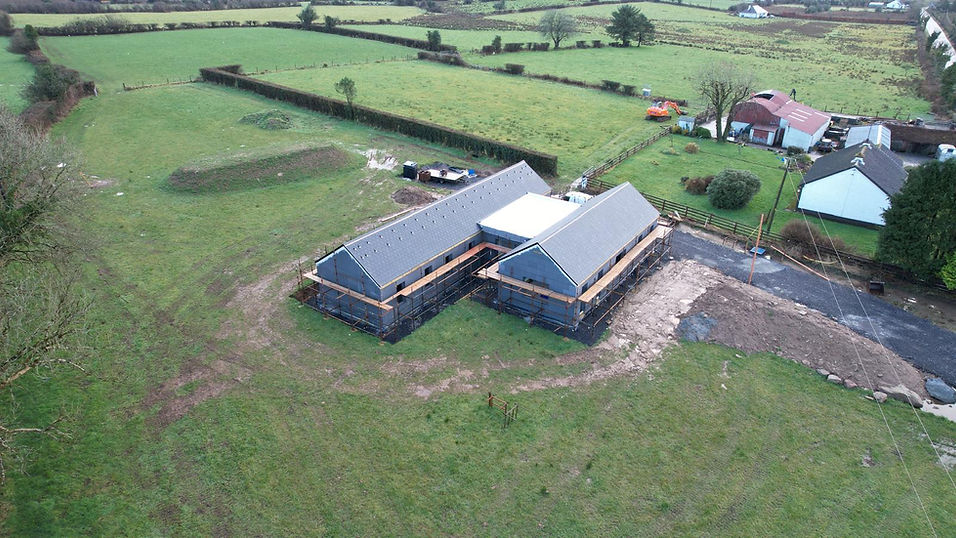 Residential construction project showing structural build phase