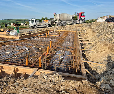 Concrete foundations being poured for a luxury residential home by Alvora Construction