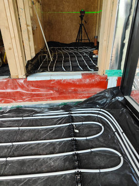 Water-based underfloor heating system installed before floor screed.