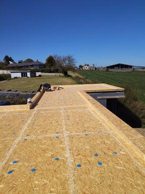 Flat roof construction stage before membrane installation with timber deck preparation