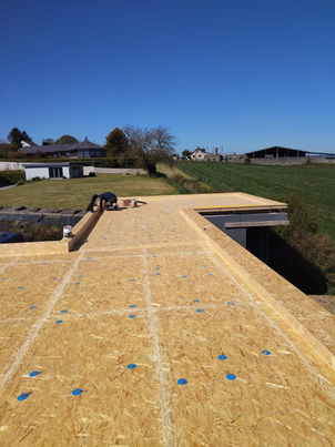 Flat roof construction stage before membrane installation with timber deck preparation