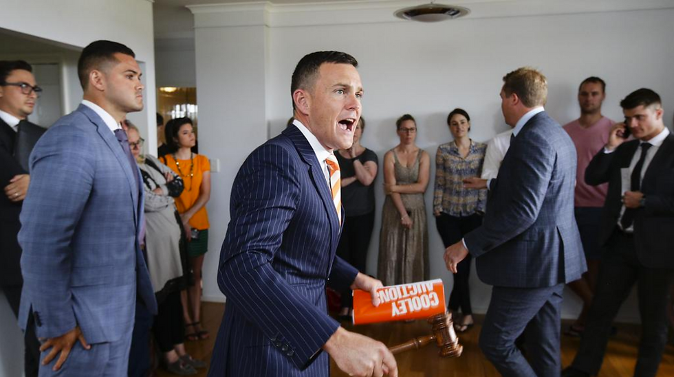 Should you hire someone to bid at an auction?