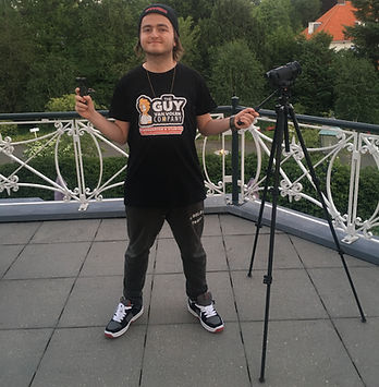 Guy van Volen wearing The Guy van Volen Company T-shirt for a promotion