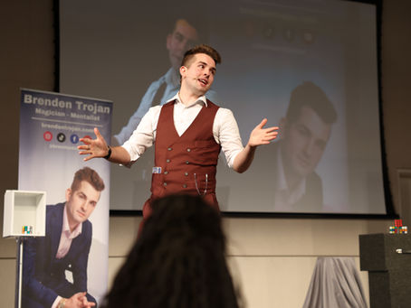 Brenden Trojan, a Columbus Ohio magician performing a stage show.